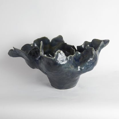 Meteor Bowl by Global Views. Made from ceramic in a coastal style.