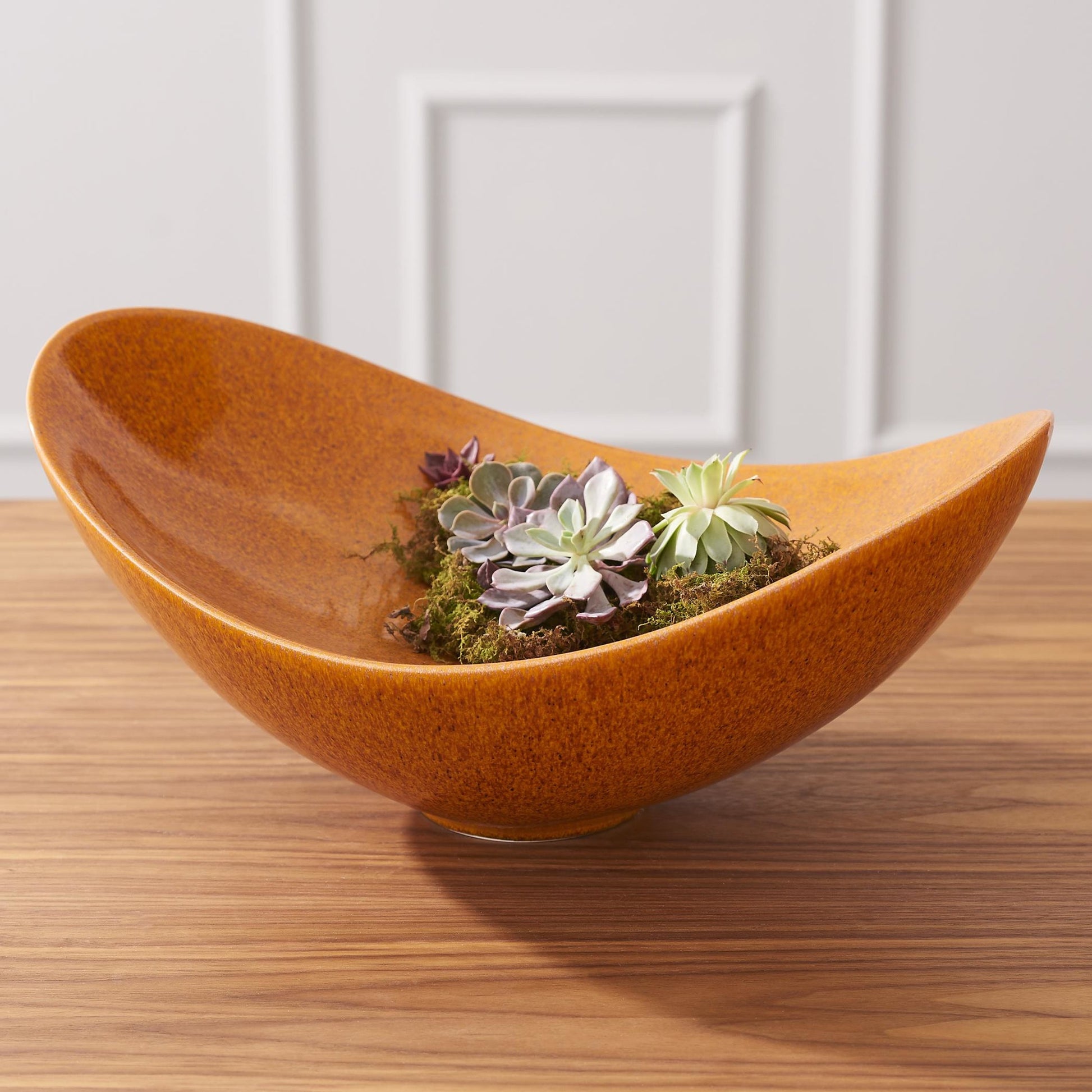 Swoop Bowl by Global Views. Made from ceramic in a modern style.
