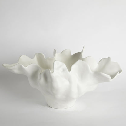 Meteor Bowl by Global Views. Made from ceramic in a coastal style.
