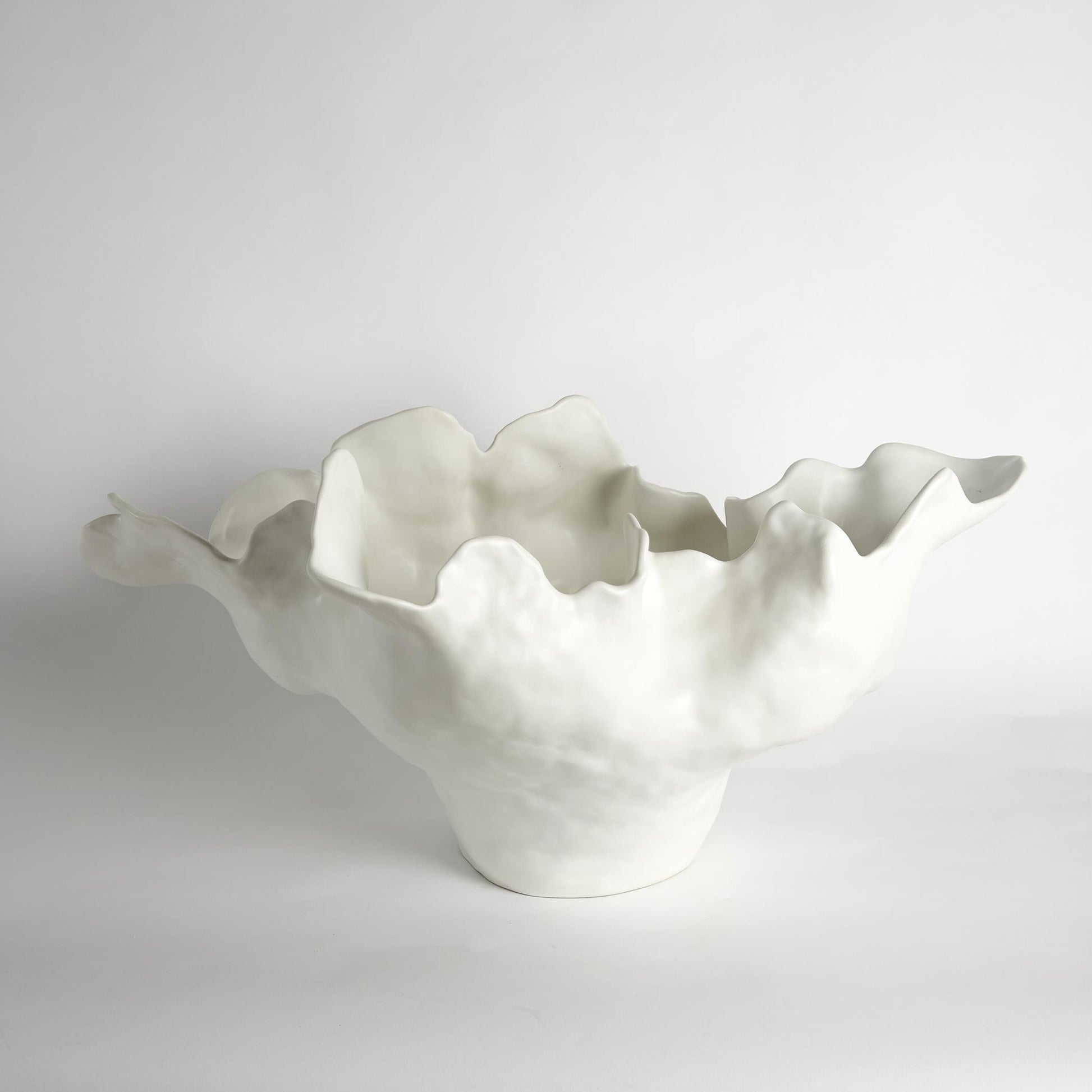 Meteor Bowl by Global Views. Made from ceramic in a coastal style.