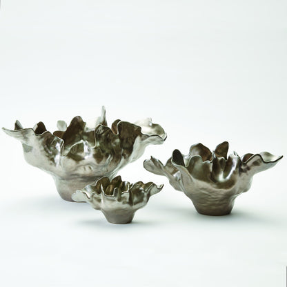 Meteor Bowl by Global Views. Made from ceramic in a coastal style.