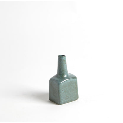 Tall Stack Bottle by Global Views in reactive ivory. Made from earthenware in a eclectic & global style.