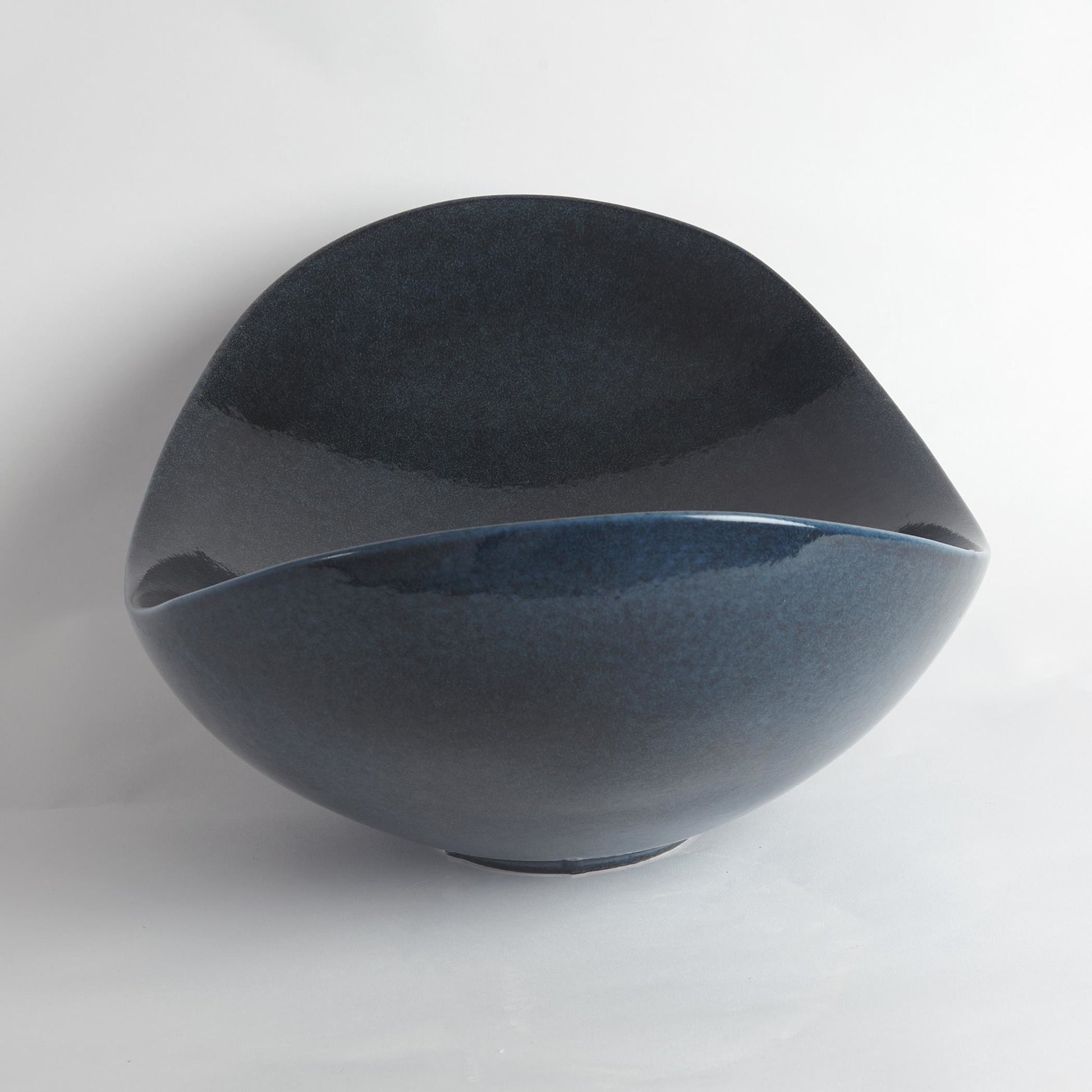 Swoop Bowl by Global Views. Made from ceramic in a modern style.