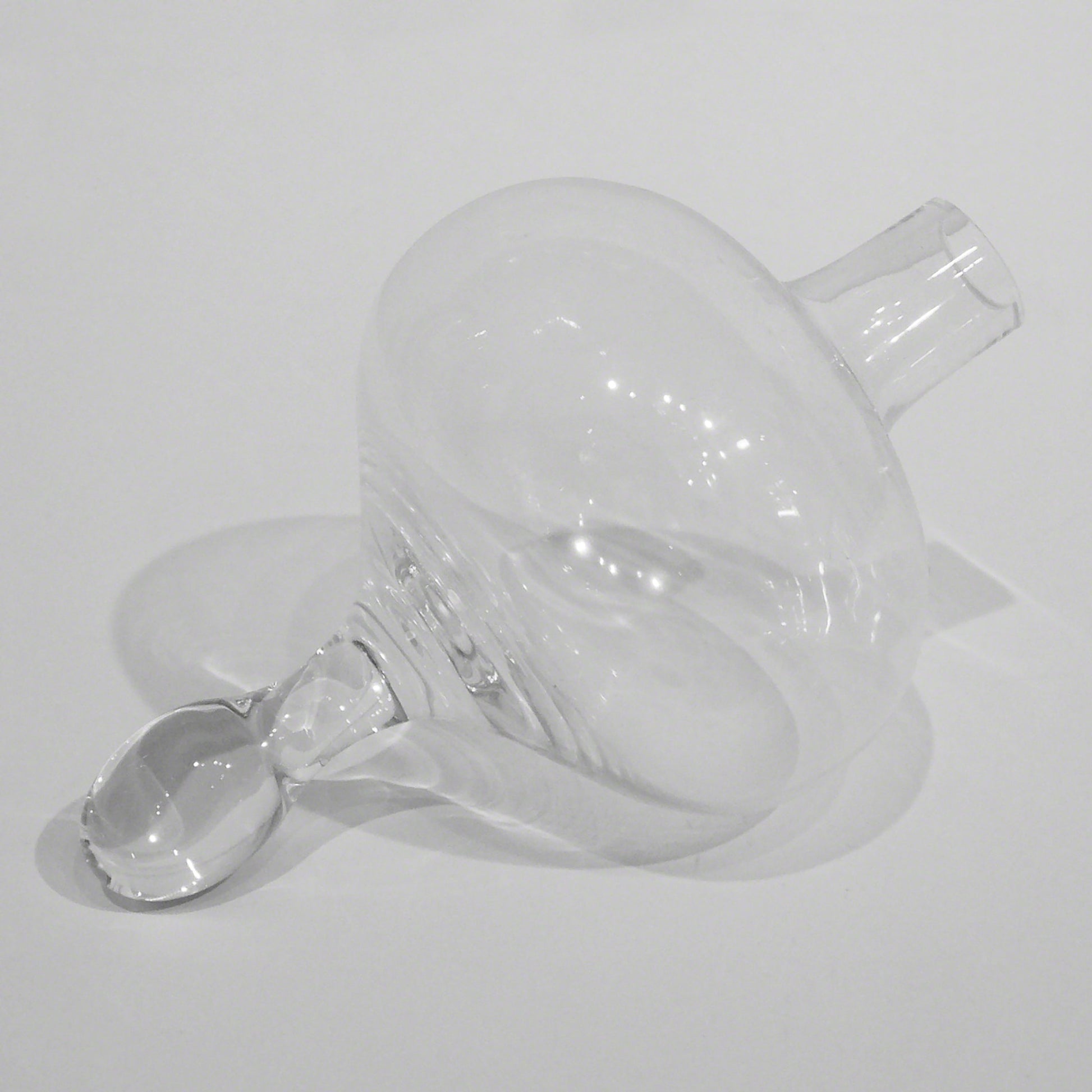 Mini Floating Droplet Vase by Global Views. Made from glass in a modern style.