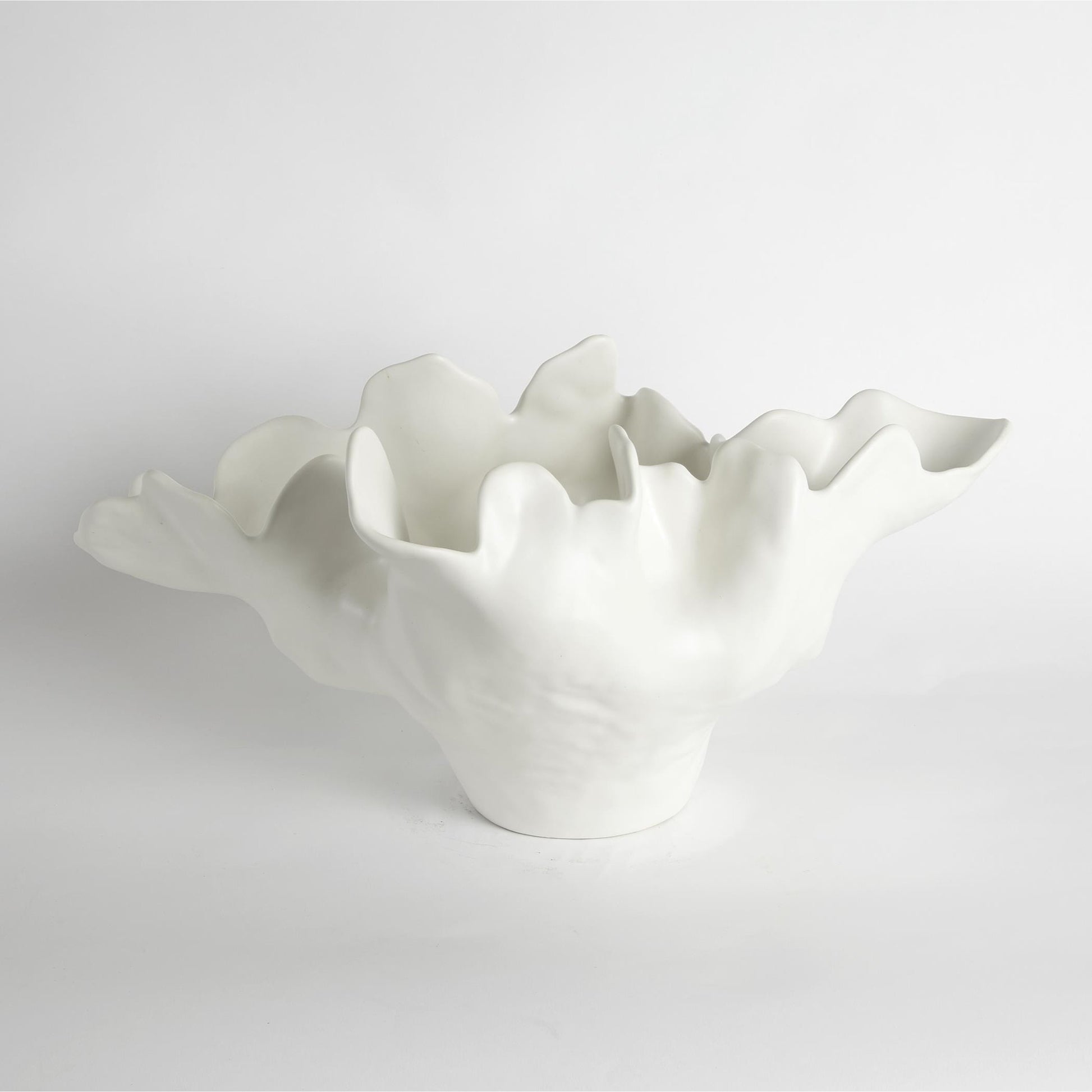 Meteor Bowl by Global Views. Made from ceramic in a coastal style.