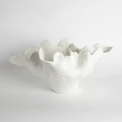 Meteor Bowl by Global Views. Made from ceramic in a coastal style.