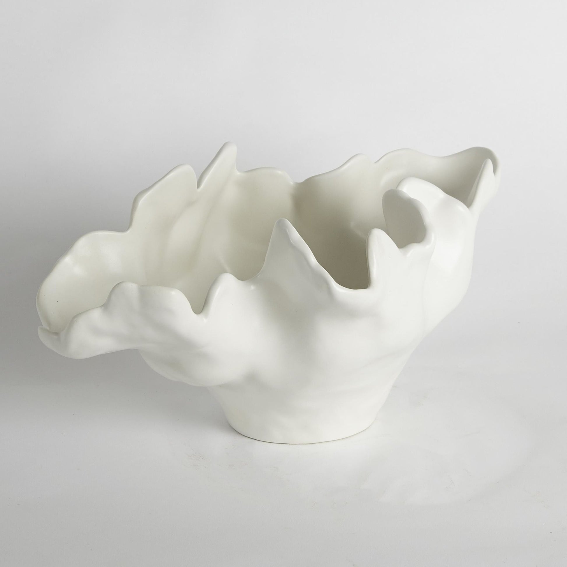 Meteor Bowl by Global Views. Made from ceramic in a coastal style.