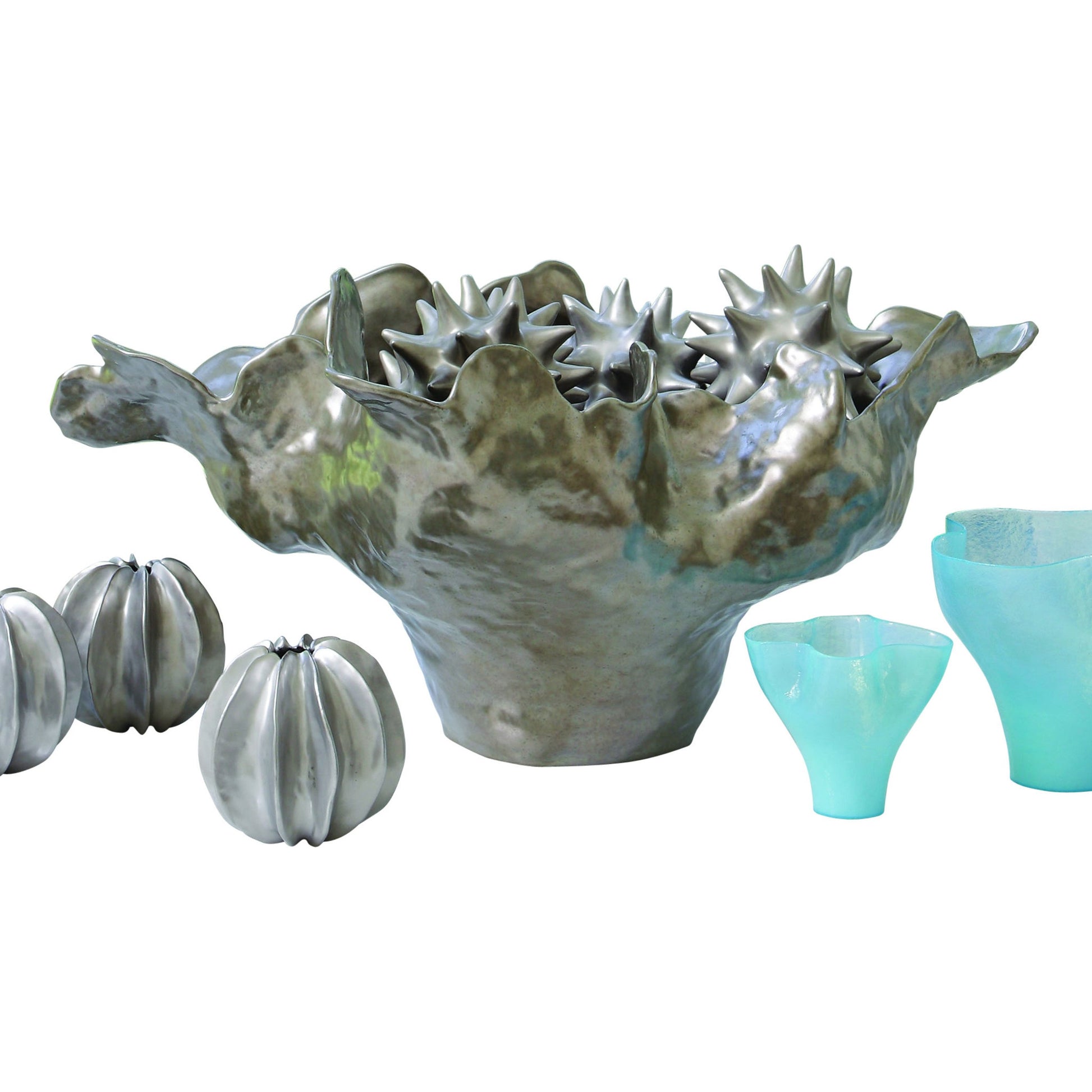 Meteor Bowl by Global Views. Made from ceramic in a coastal style.