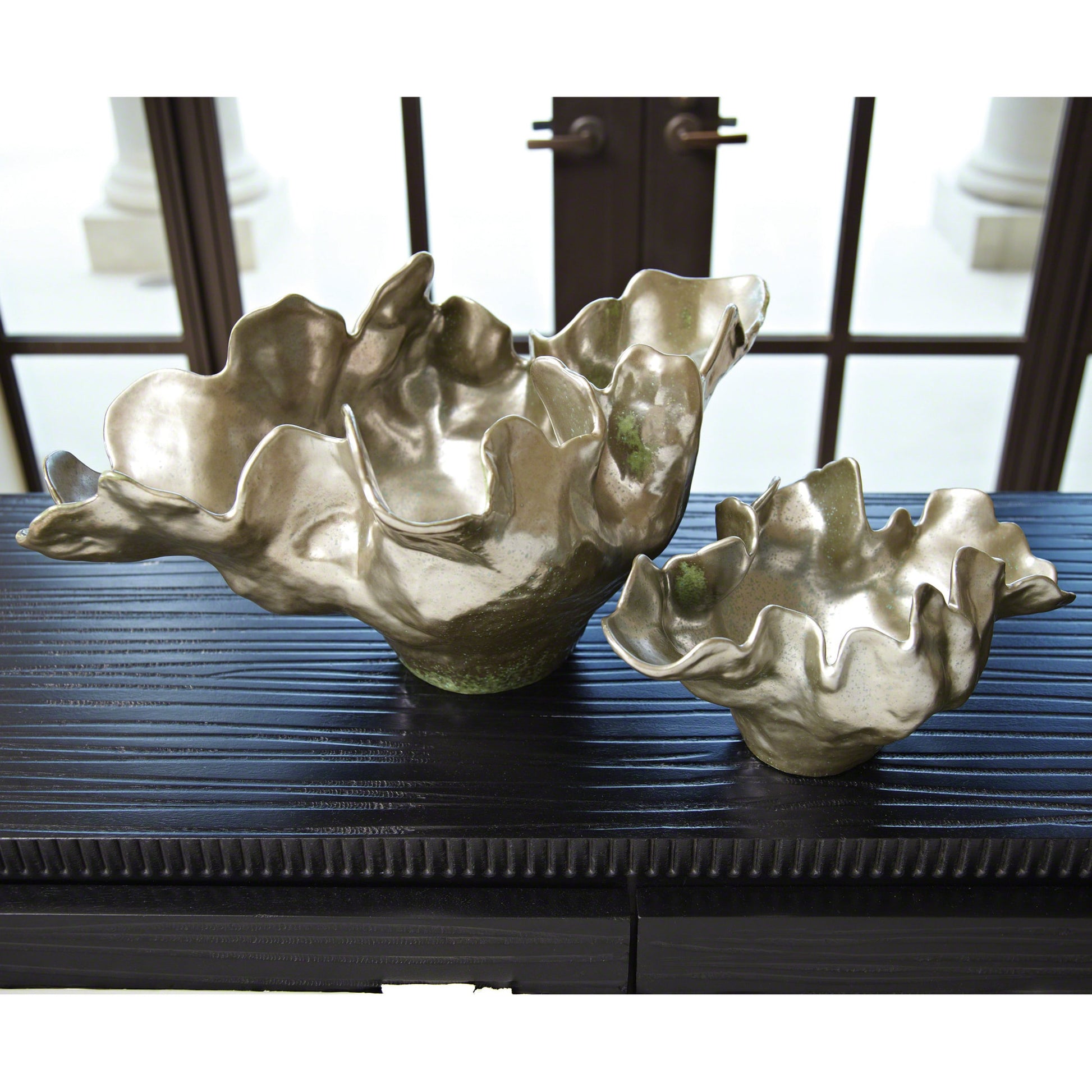 Meteor Bowl by Global Views. Made from ceramic in a coastal style.