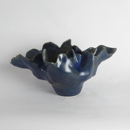 Meteor Bowl by Global Views. Made from ceramic in a coastal style.