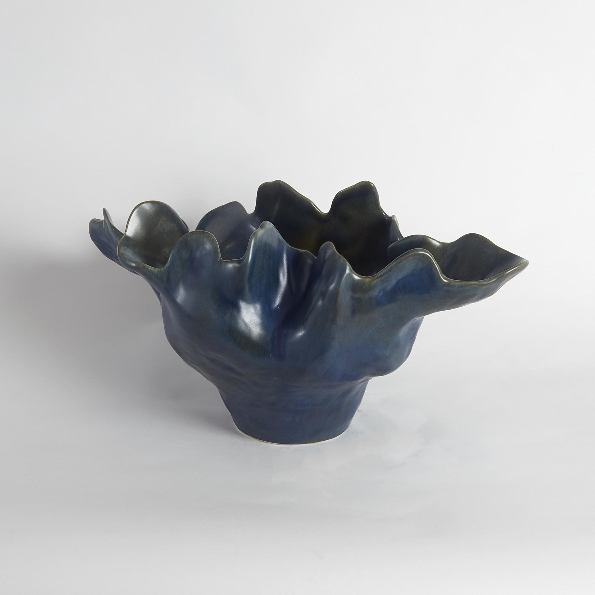 Meteor Bowl by Global Views. Made from ceramic in a coastal style.