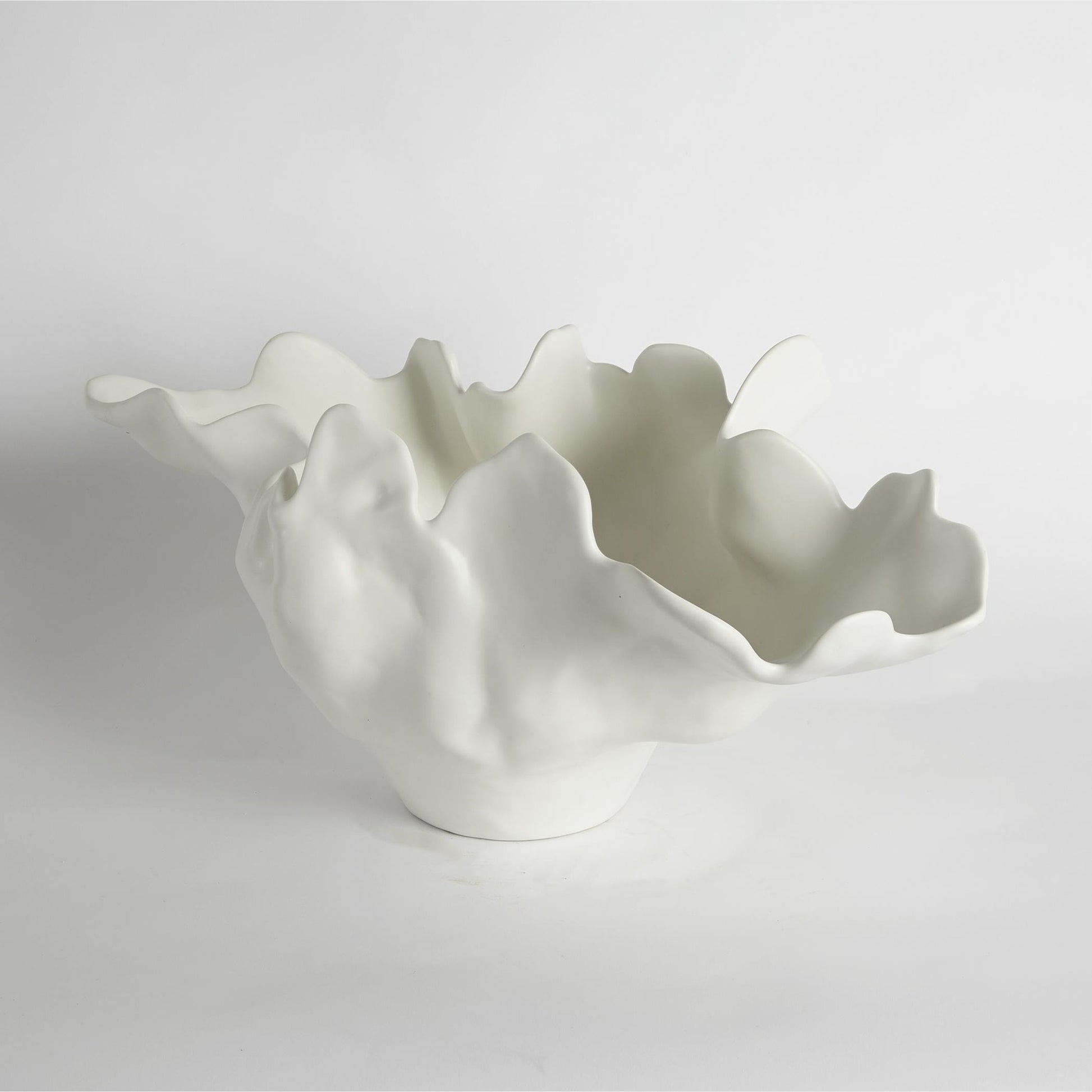Meteor Bowl by Global Views. Made from ceramic in a coastal style.