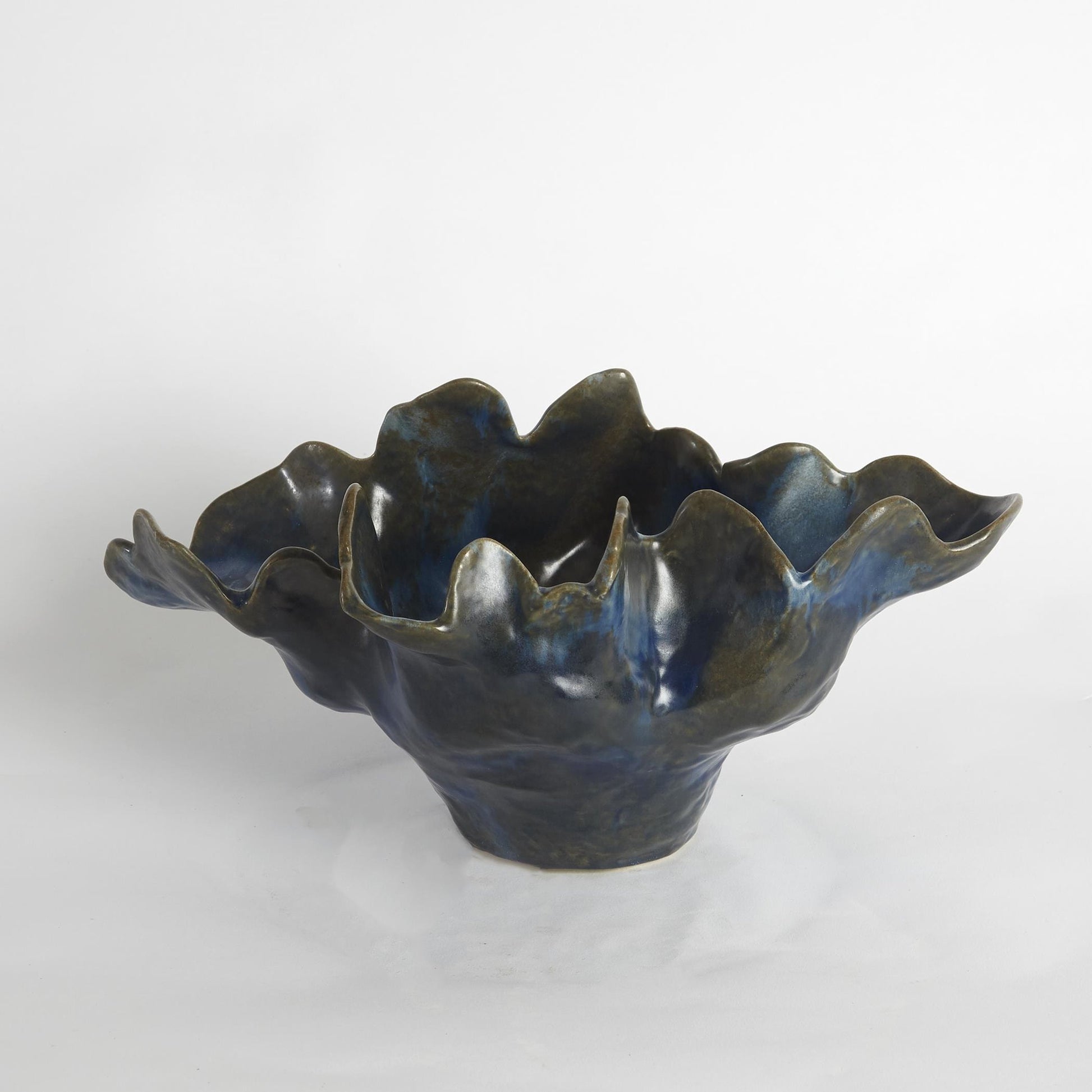 Meteor Bowl by Global Views. Made from ceramic in a coastal style.