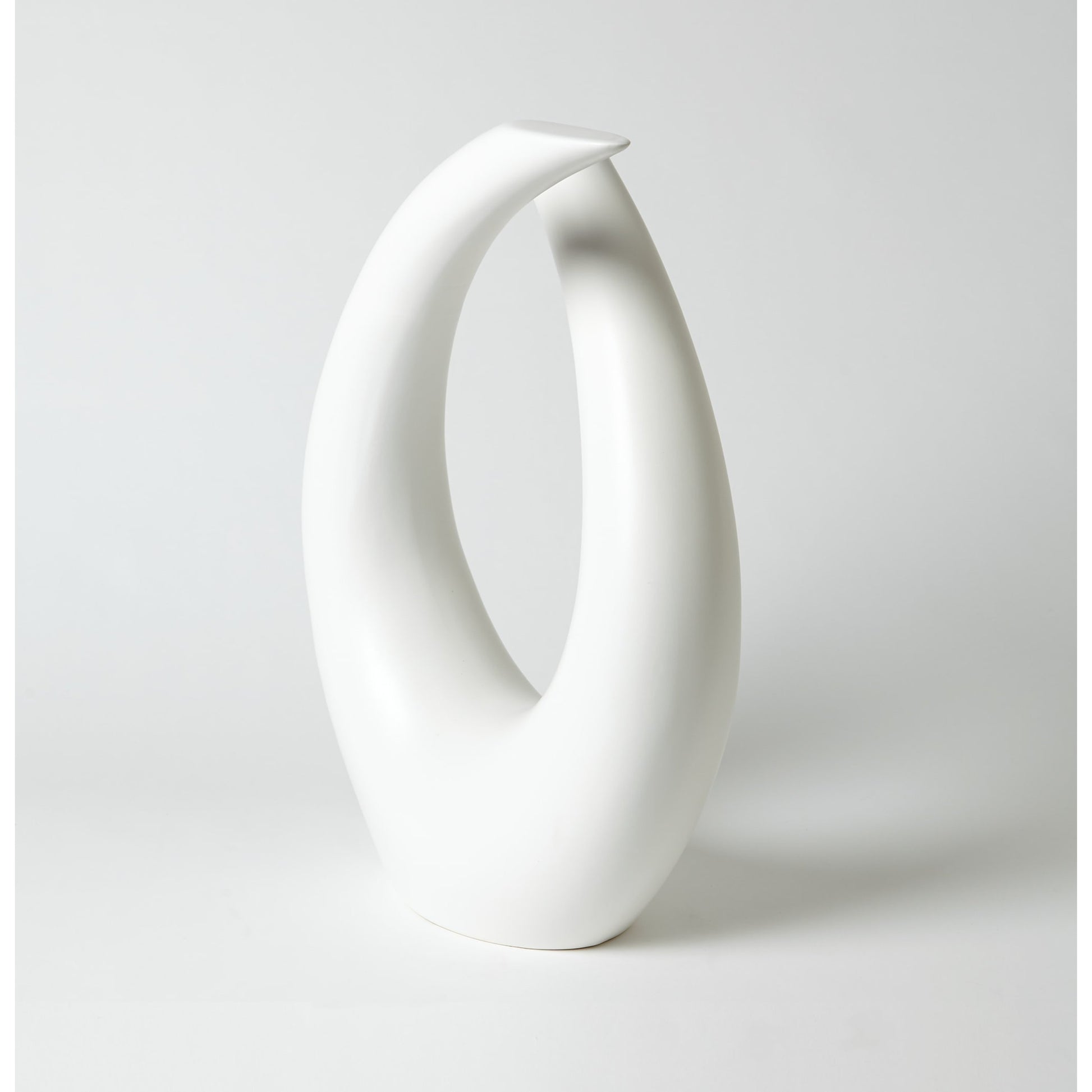 Loop Sculpture by Global Views. Made from ceramic in a modern style.