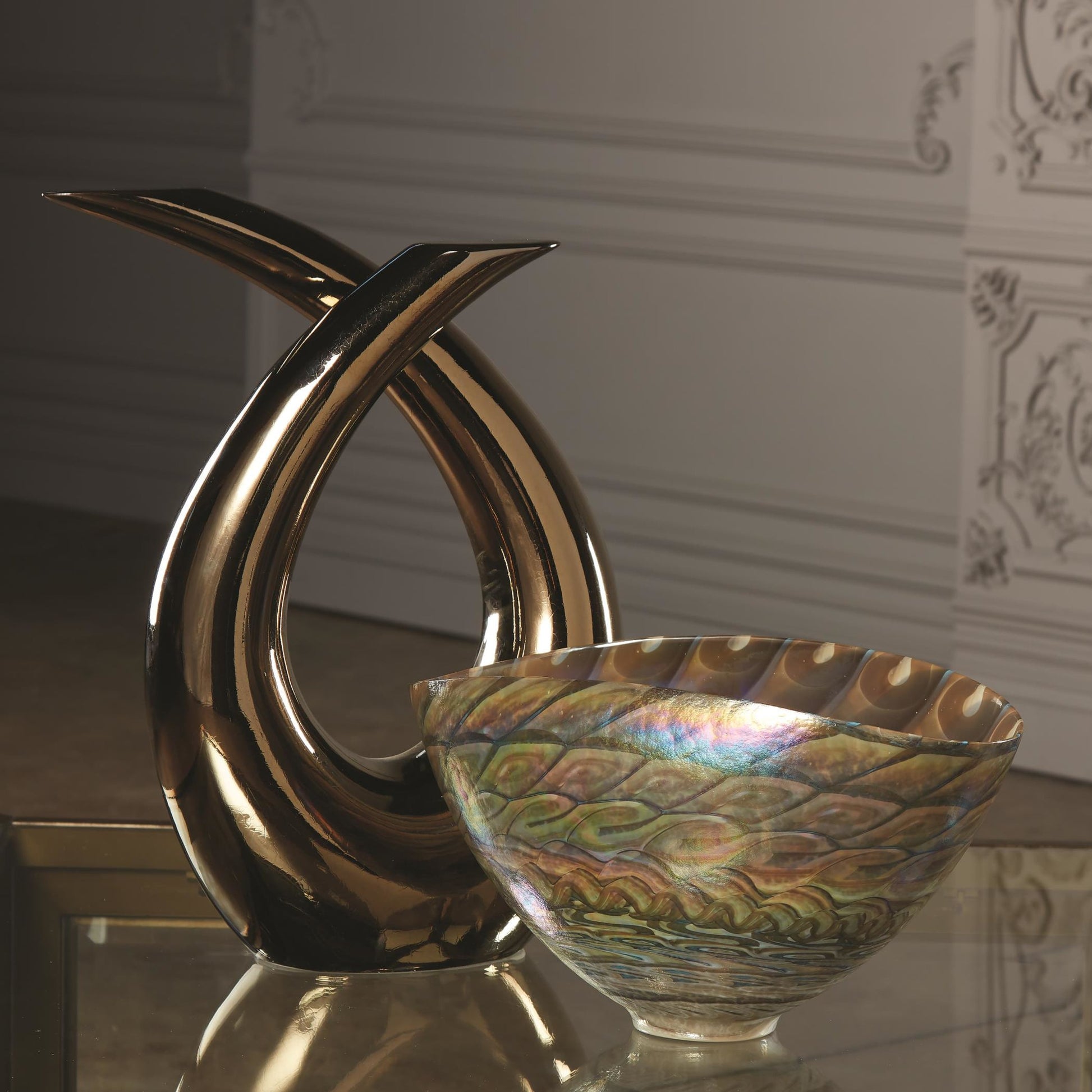 Loop Sculpture by Global Views. Made from ceramic in a modern style.