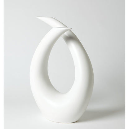 Loop Sculpture by Global Views. Made from ceramic in a modern style.