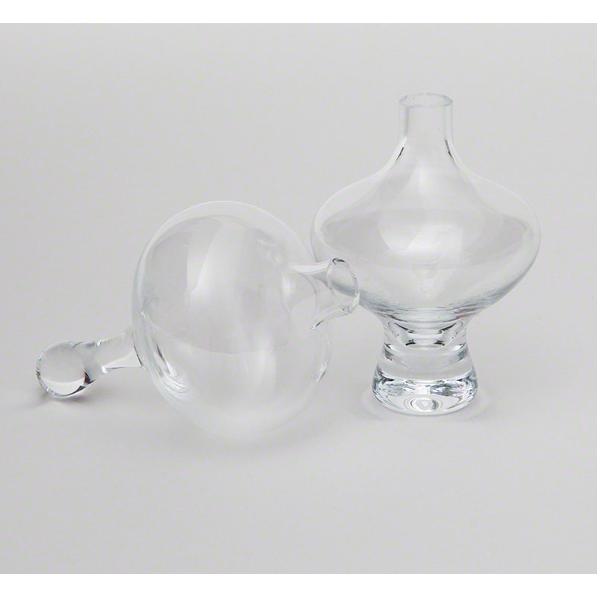 Mini Floating Footed Vase by Global Views. Made from glass in a modern style.