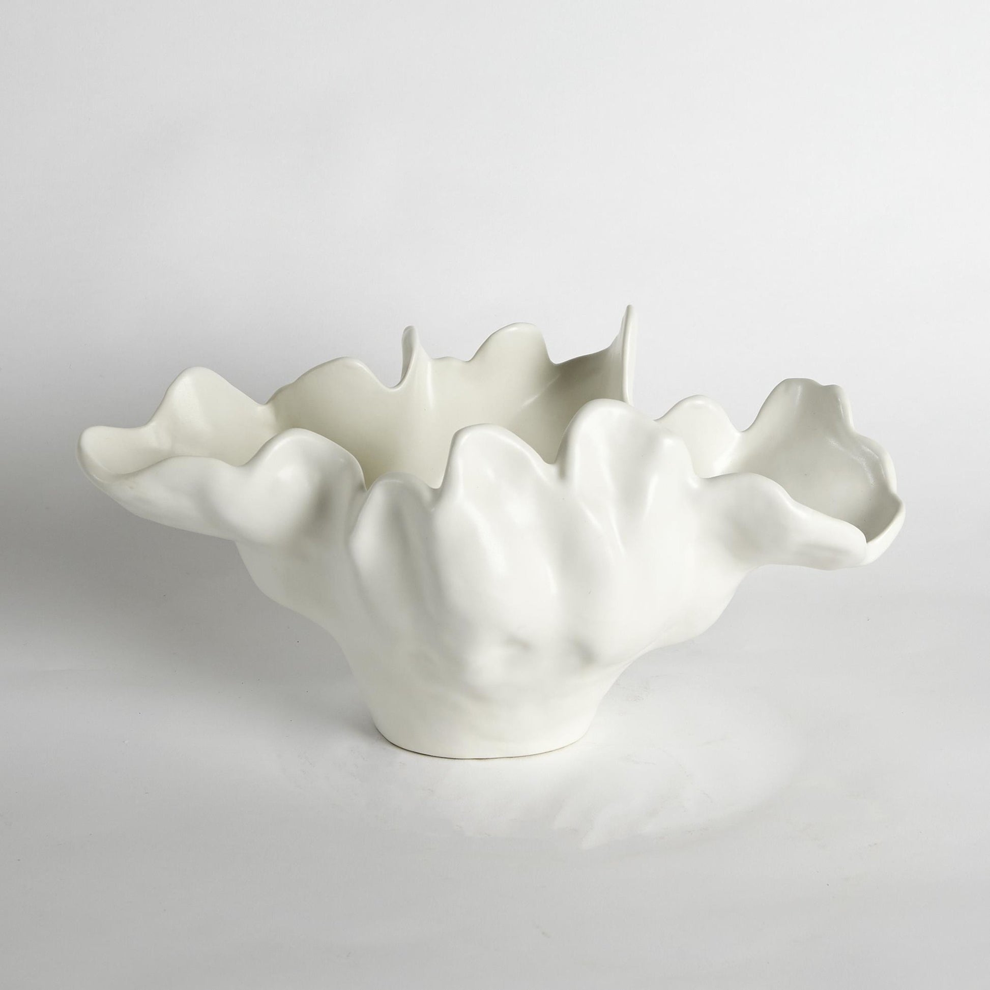 Meteor Bowl by Global Views. Made from ceramic in a coastal style.