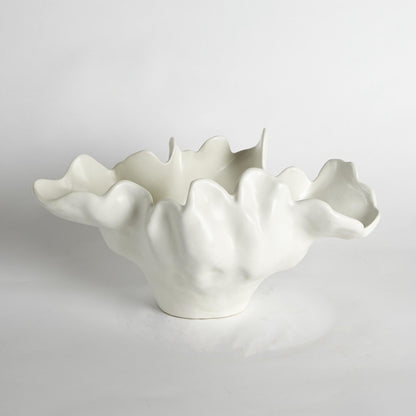 Meteor Bowl by Global Views. Made from ceramic in a coastal style.