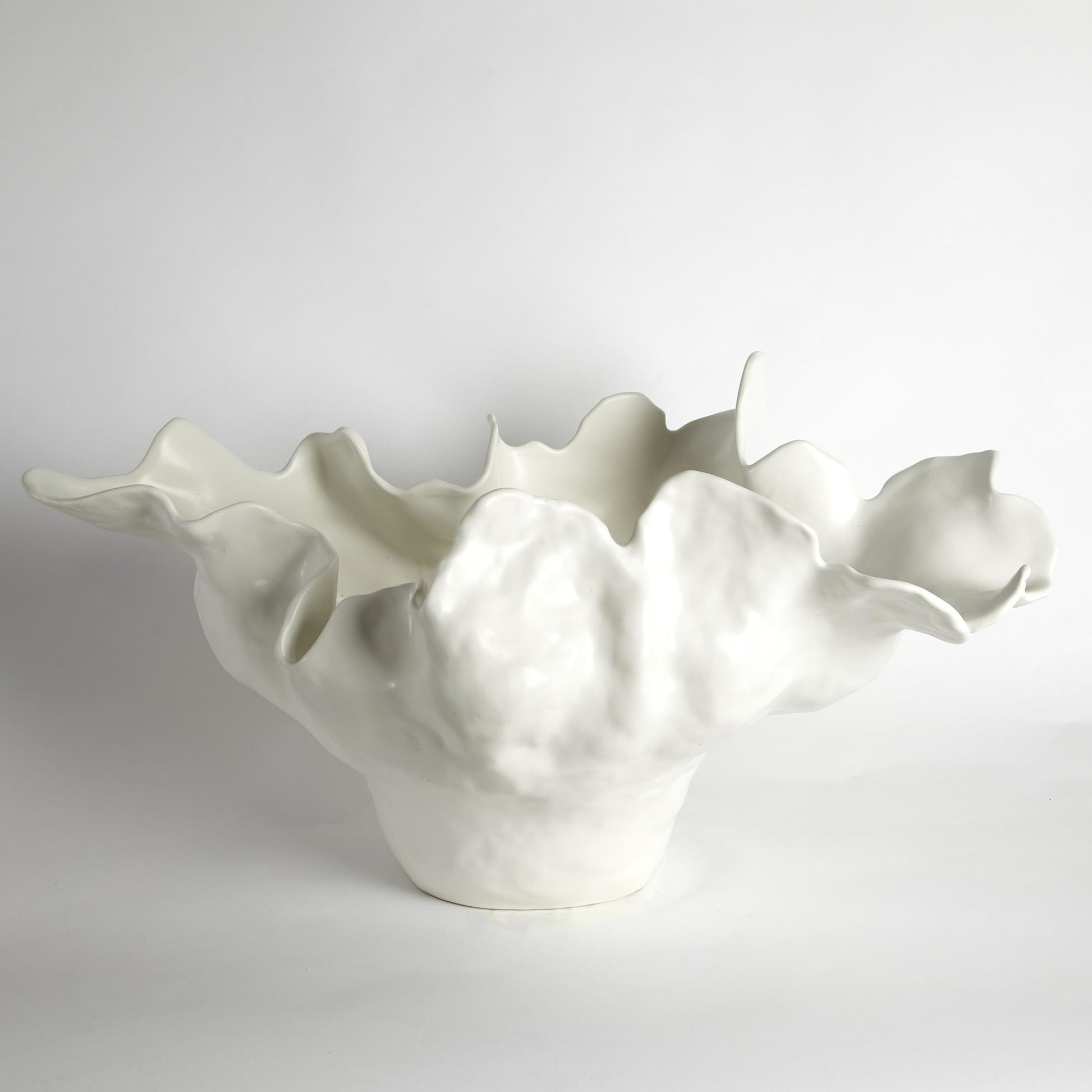 Meteor Bowl by Global Views. Made from ceramic in a coastal style.