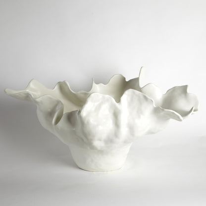 Meteor Bowl by Global Views. Made from ceramic in a coastal style.