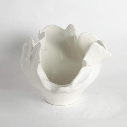 Meteor Bowl by Global Views. Made from ceramic in a coastal style.