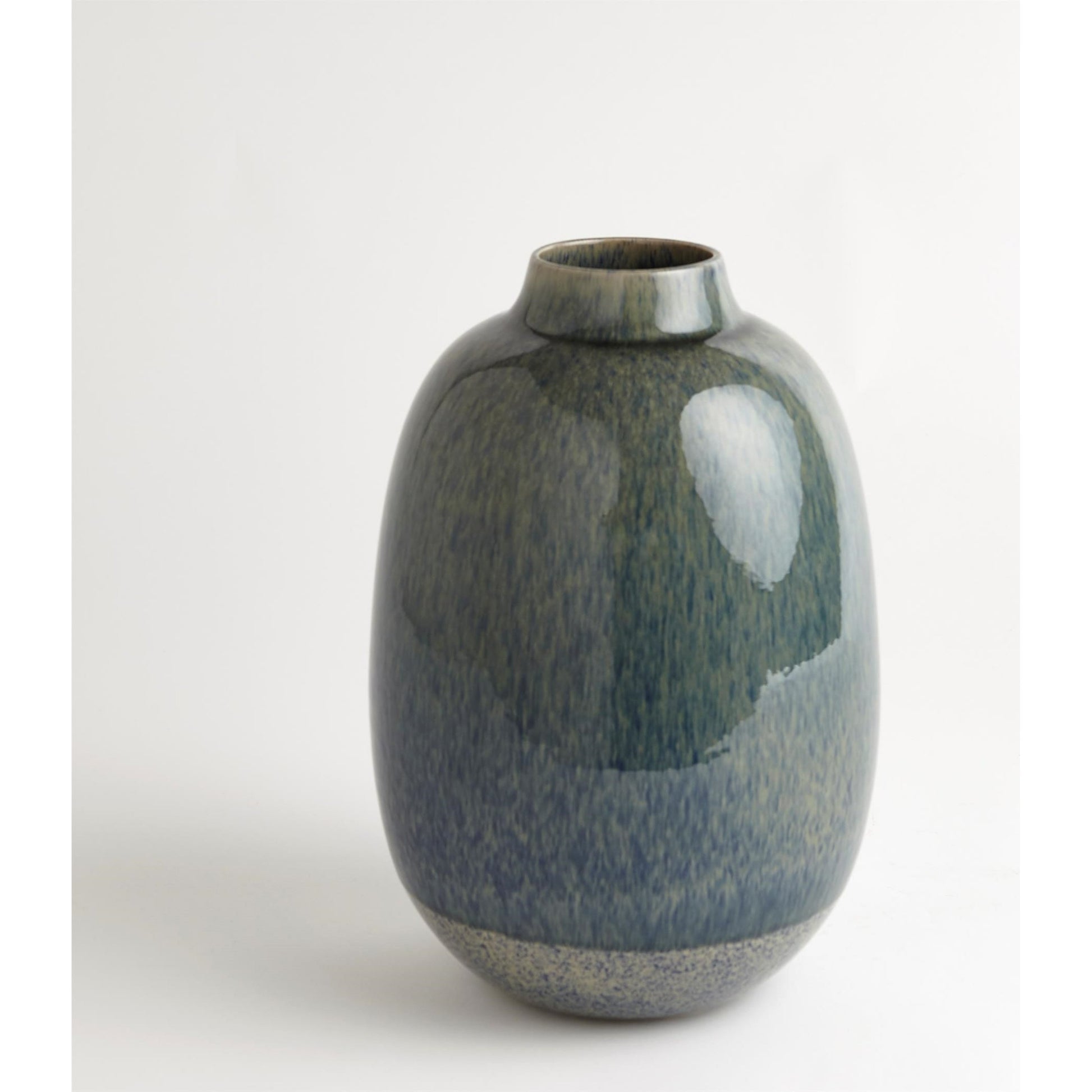 Tidal Vase by Global Views. Made from earthenware in a transitional style.