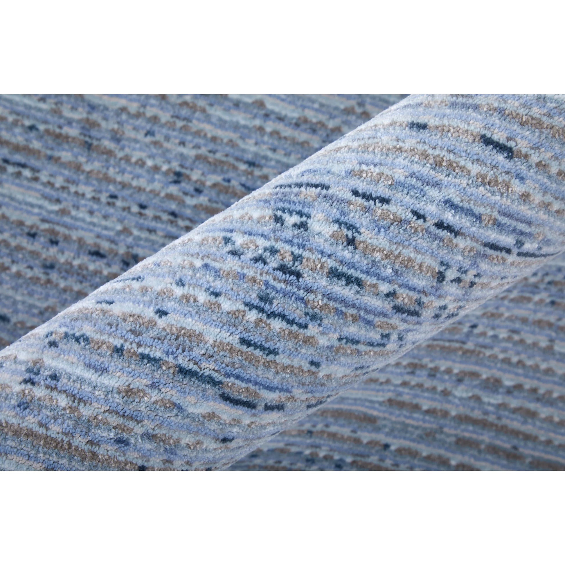 Deja Solid Rug - DJA39PJF by Feizy. Made from polypropylene, polyester in a unique style.