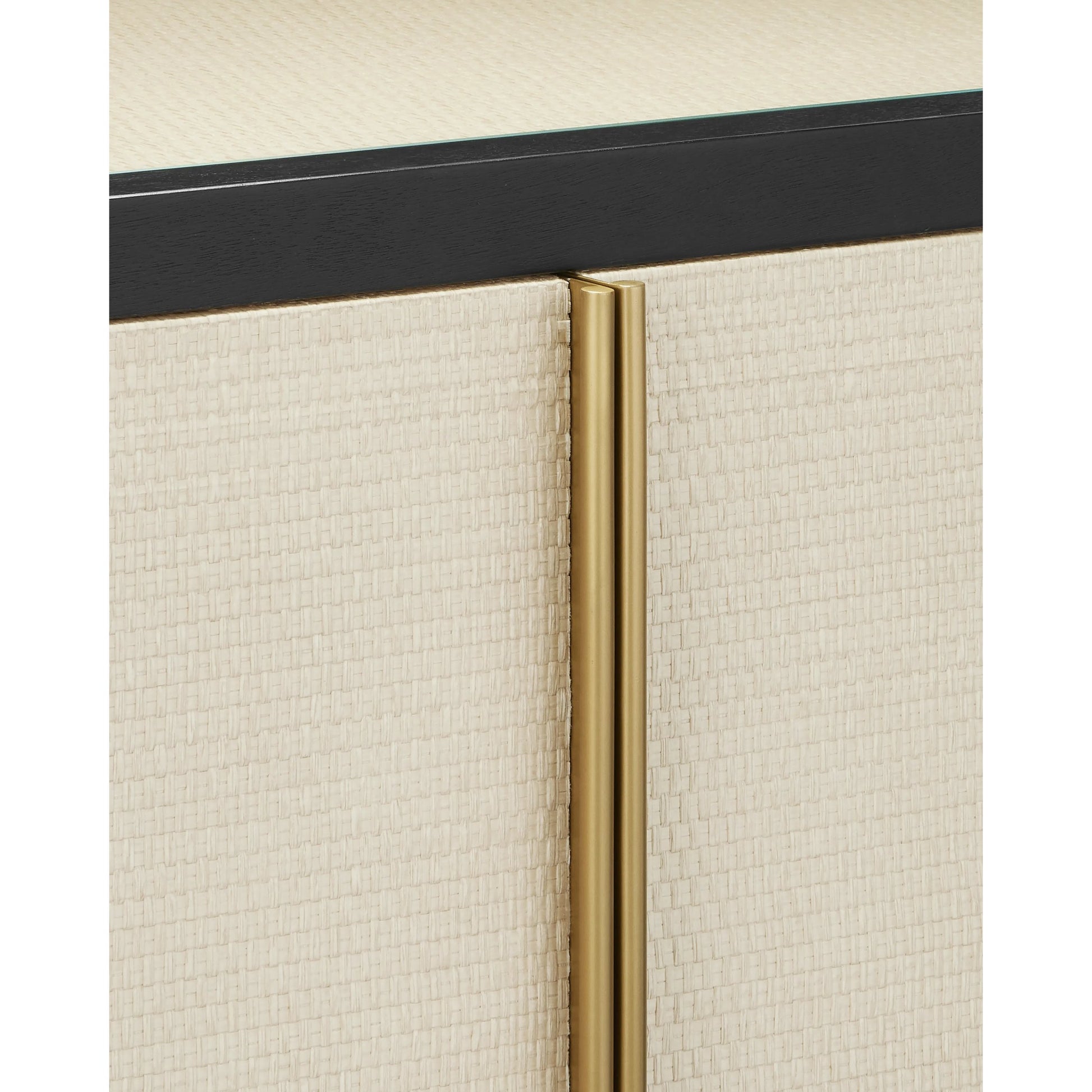 Deanna Raffia Credenza by Currey and Company in ivory, black, satin brass, natural, clear. Made from raffia, okume veneer, stainless steel, sycamore veneer, tempered glass in a modern style.