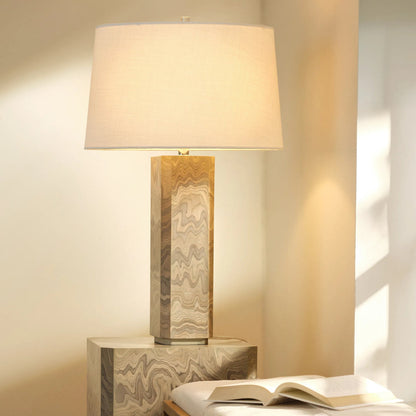 Canyon Table Lamp by Jamie Young in grey and sand grey. Made from wood in a unique style.