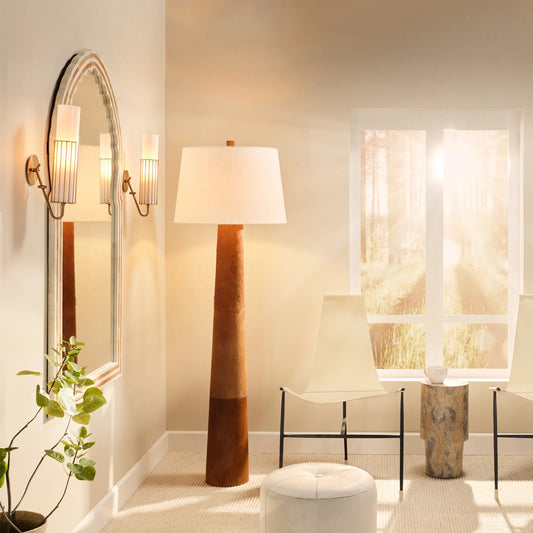 Robertson Floor Lamp by Jamie Young. Made from leather in a unique style.