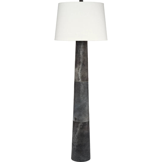 Robertson Floor Lamp by Jamie Young. Made from leather in a unique style.