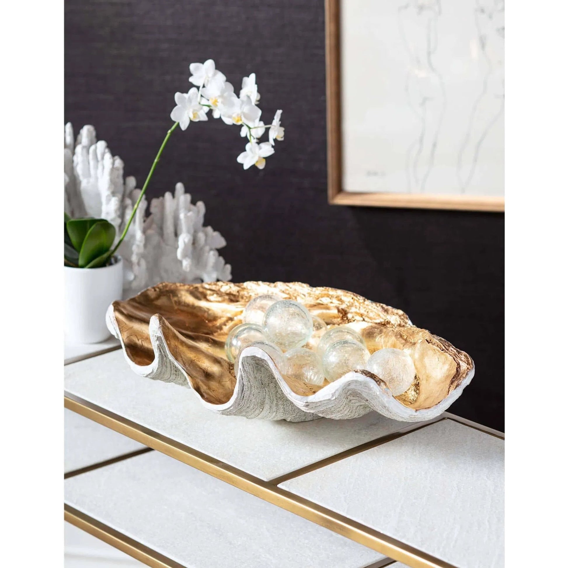 Clam Bowl by Regina Andrew. Made from resin in a coastal style.