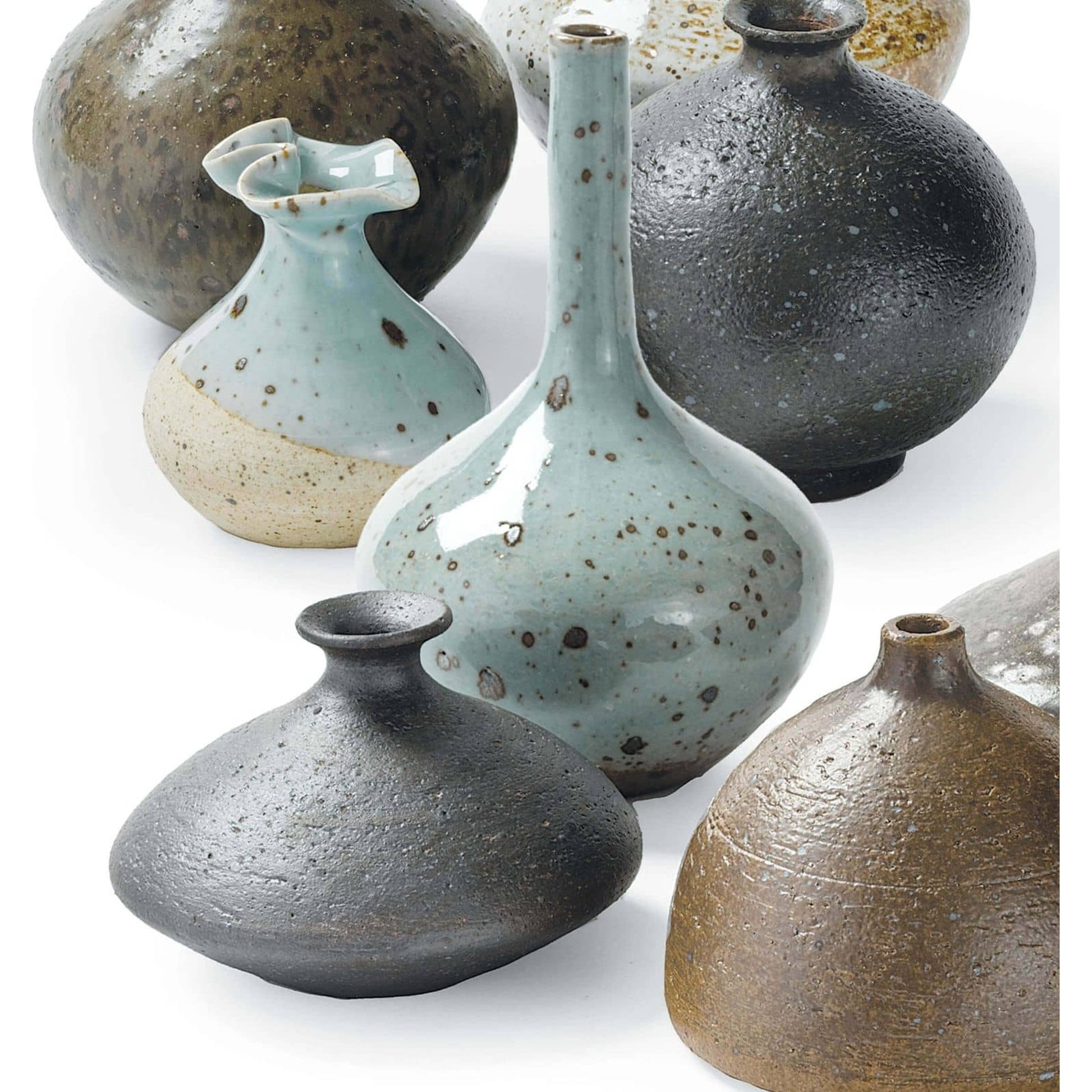 Porcelain Bud Vases by Regina Andrew in brown. Made from ceramic in a eclectic & global style.