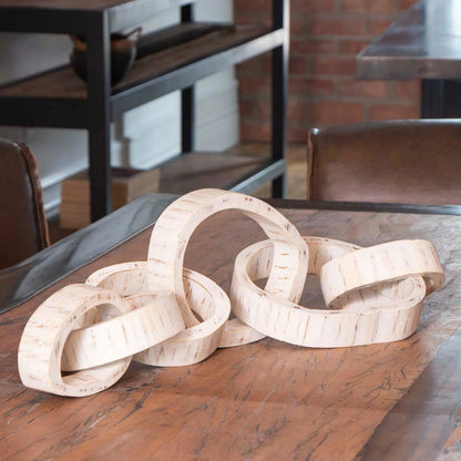 Wooden Links Centerpiece by Regina Andrew. Made from acacia wood in a modern style.