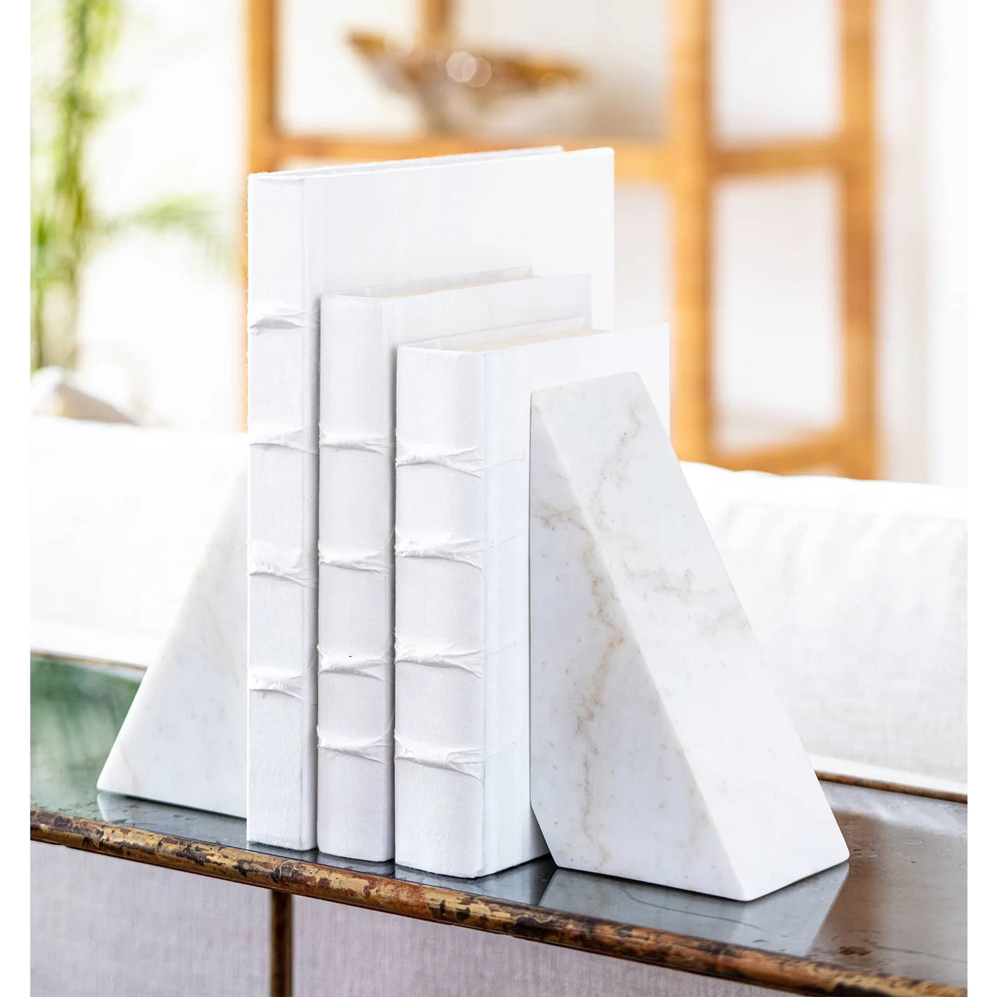 Othello Marble Bookends by Regina Andrew in white. Made from marble in a eclectic & global style.