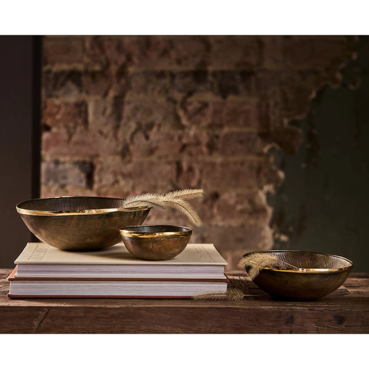 Cora Horn Bowl Set by Regina Andrew in brown and natural. Made from horn in a unique style.