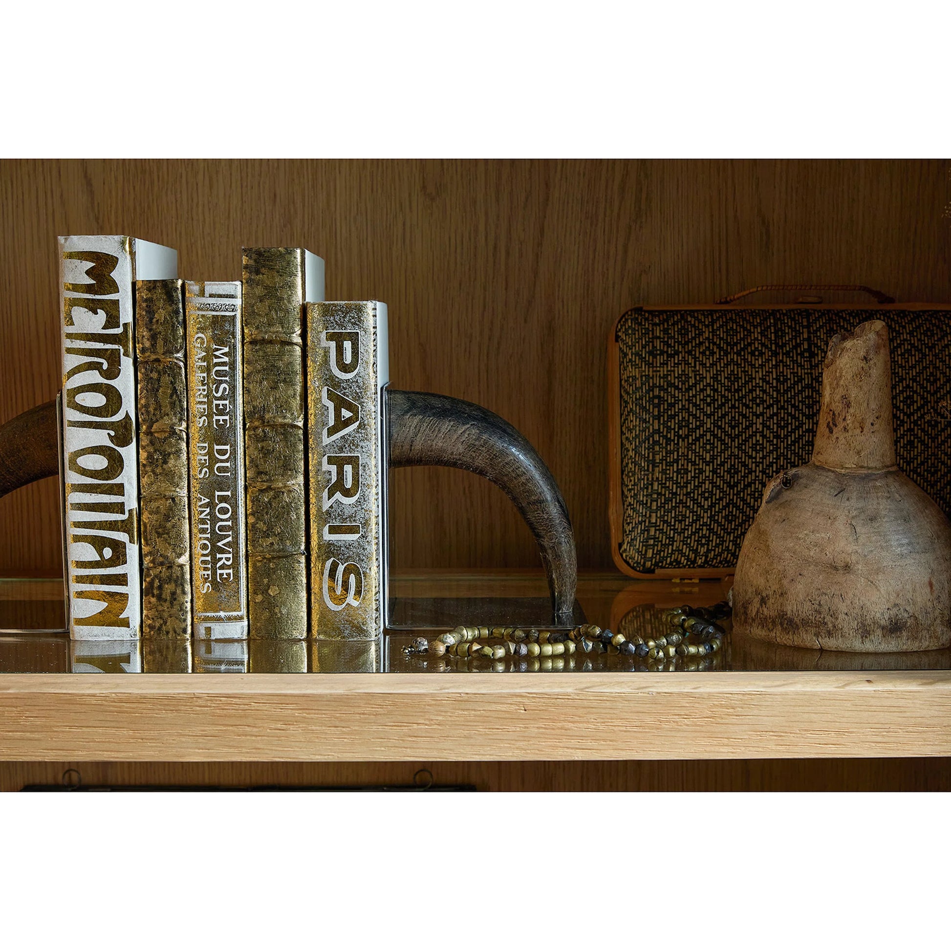 Lisbon Horn Bookend Set by Regina Andrew in brown and natural. Made from horn in a unique style.