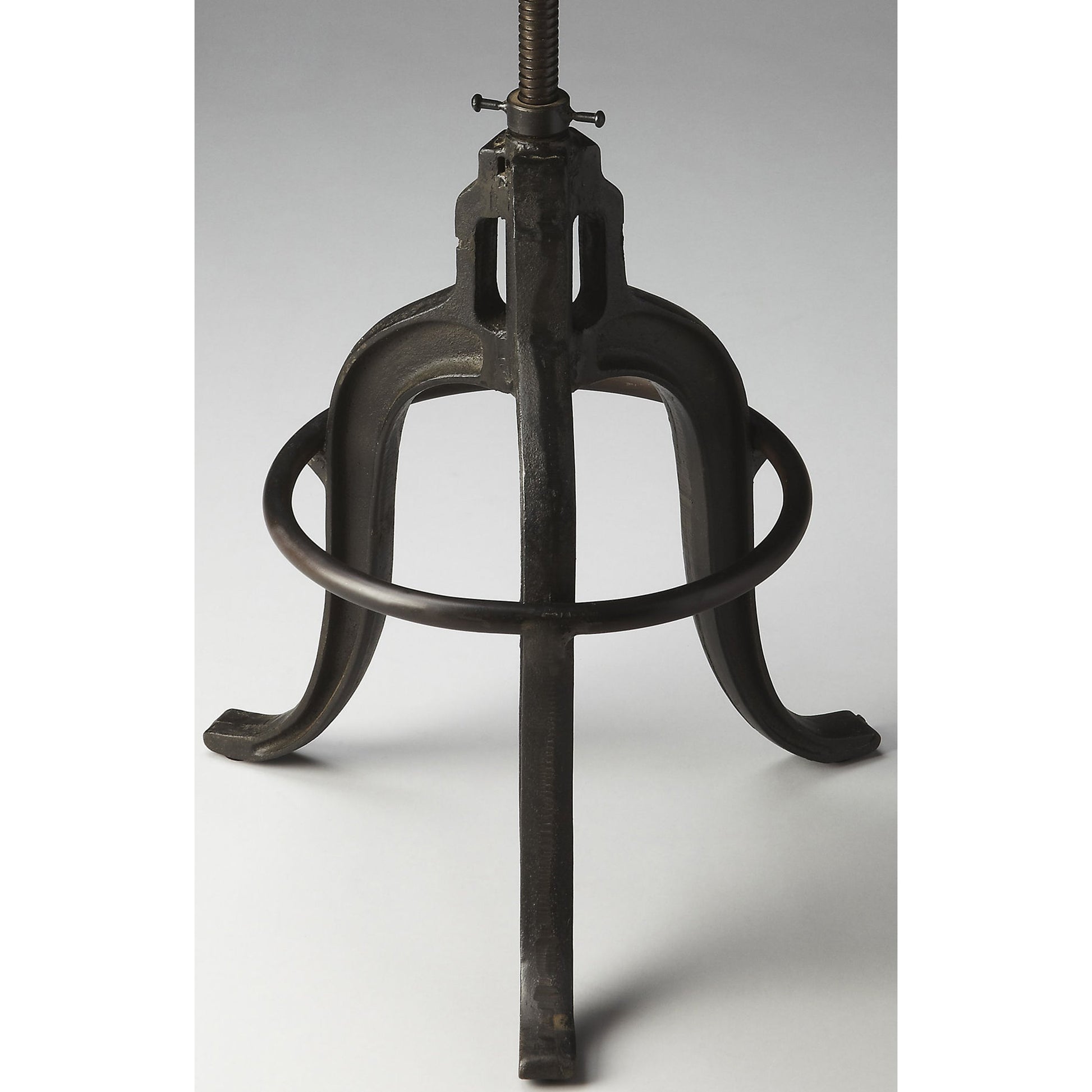 Gladney Revolving Bar Stool by Butler Specialty Company in multi-color and metalworks. Made from iron, recycled wood solids in a modern style.