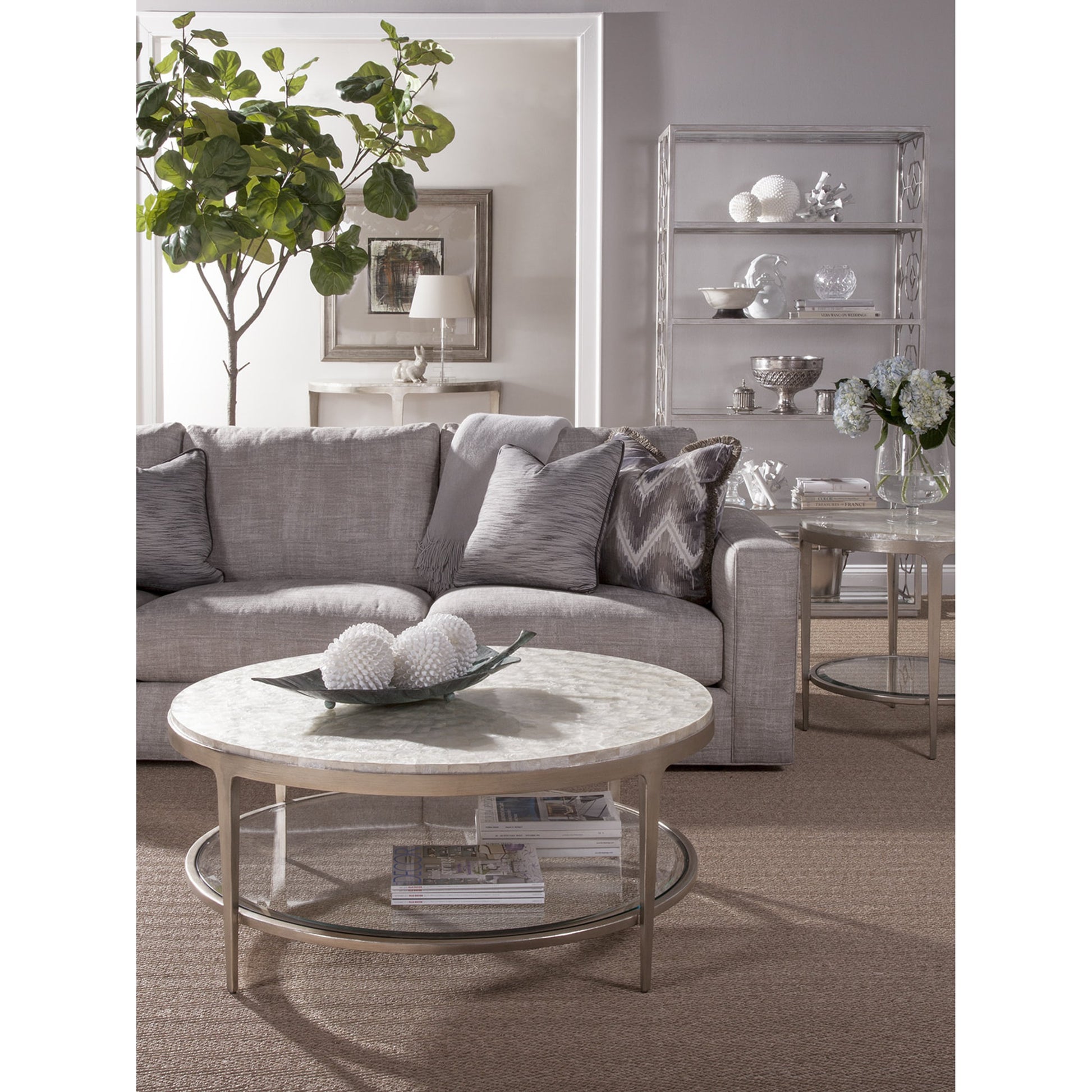 Gravitas Cocktail Table by Artistica Home in champagne foil. Made from unique in a modern style.