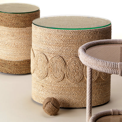 Barbados Oval Side Table by Jamie Young in off-white. Made from corn straw rope with tempered glass in a coastal style.