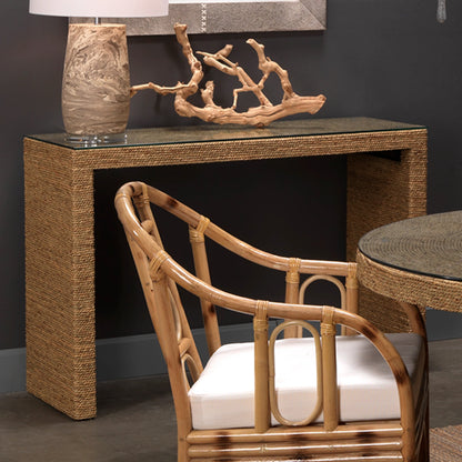 Captain Console Table by Jamie Young. Made from seagrass with tempered glass in a coastal style.