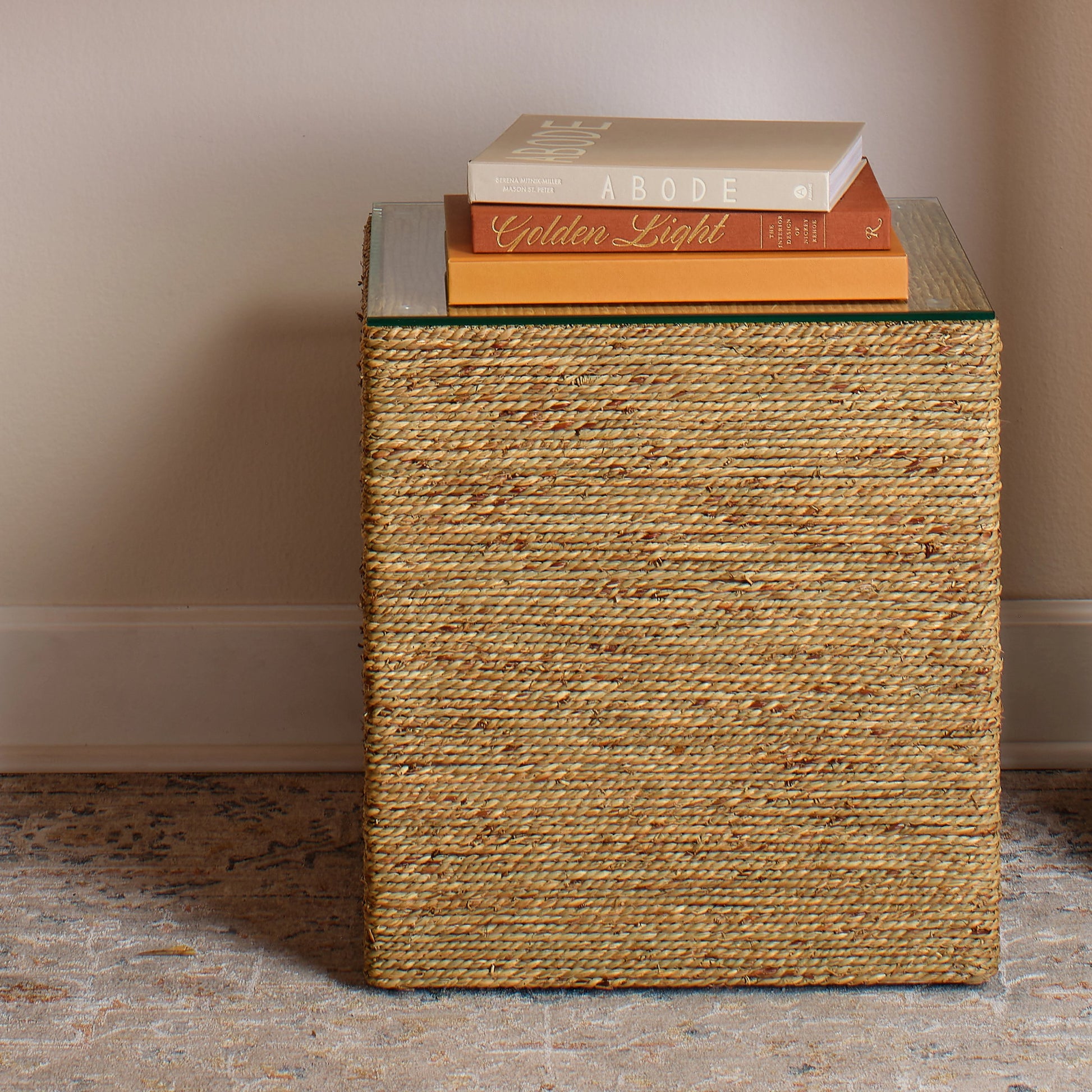 Captain Square Side Table by Jamie Young. Made from seagrass with tempered glass in a coastal style.