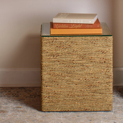 Captain Square Side Table by Jamie Young. Made from seagrass with tempered glass in a coastal style.
