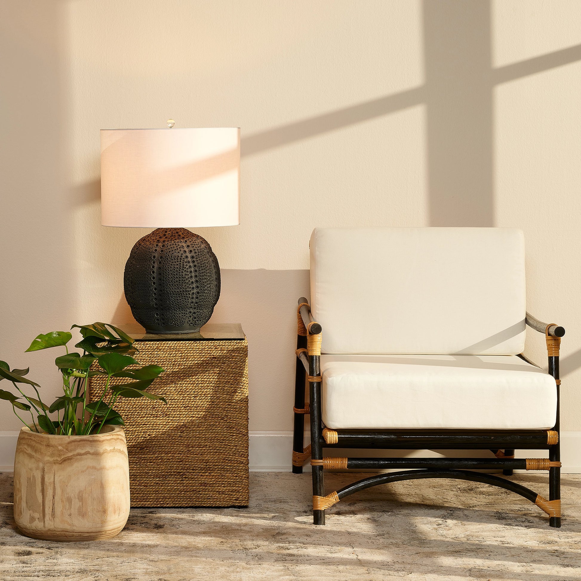 Captain Square Side Table by Jamie Young. Made from seagrass with tempered glass in a coastal style.