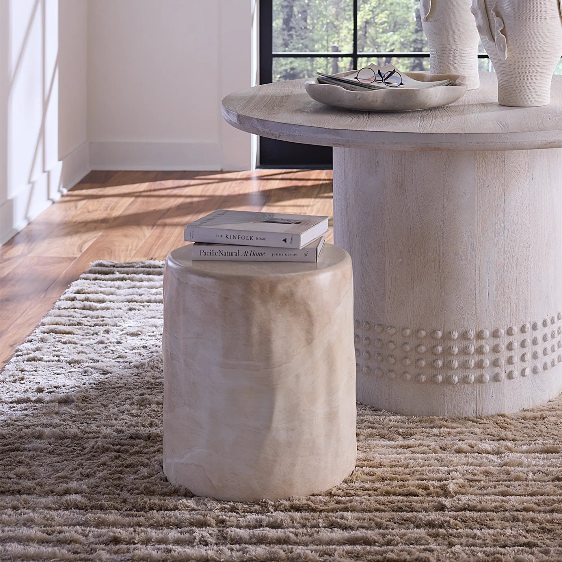 Cedar Side Table by Jamie Young in faux travertine marble. Made from concrete in a unique style.