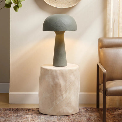 Cedar Side Table by Jamie Young in faux travertine marble. Made from concrete in a unique style.