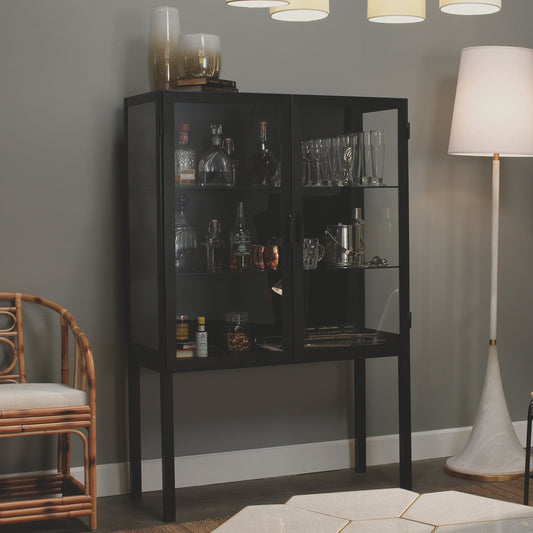 Chauncey Curio Bar Cabinet by Jamie Young in black iron, clear glass. Made from iron, glass in a modern style.
