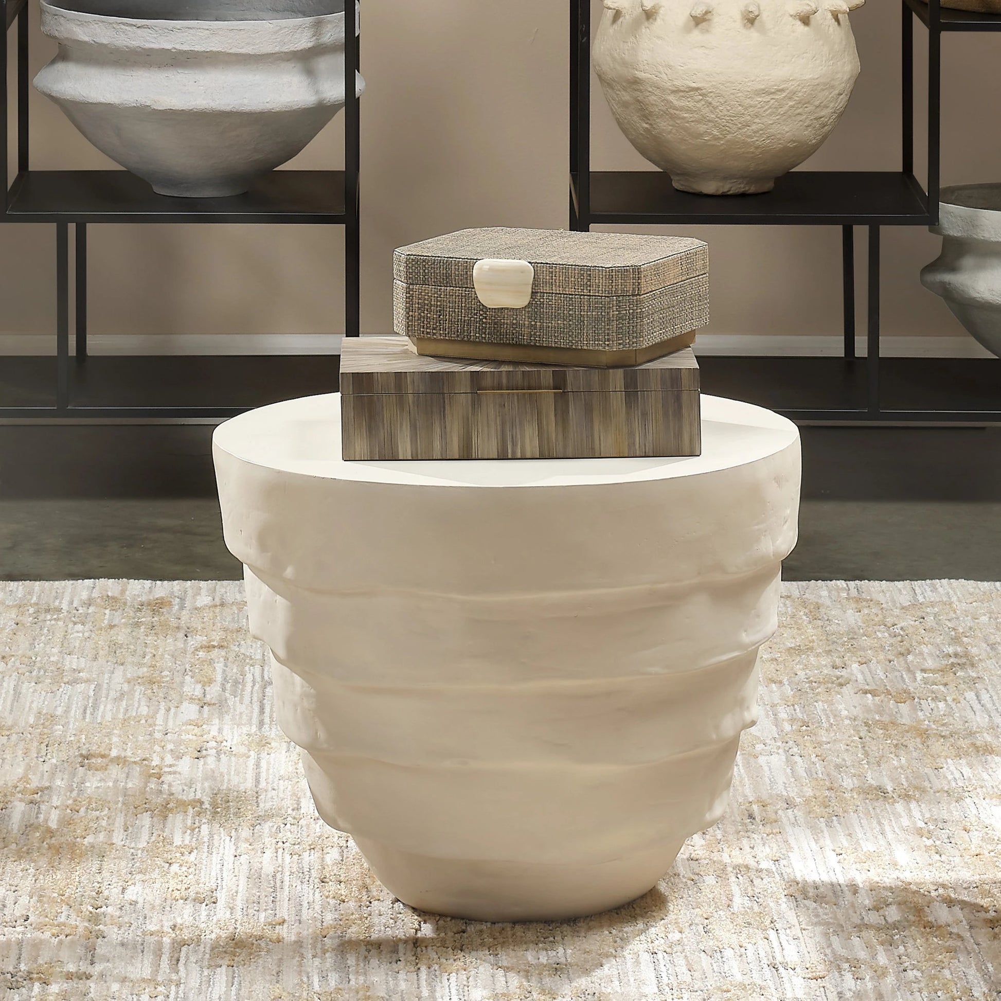 Concentric Side Table by Jamie Young. Made from fiber glass in a modern style.