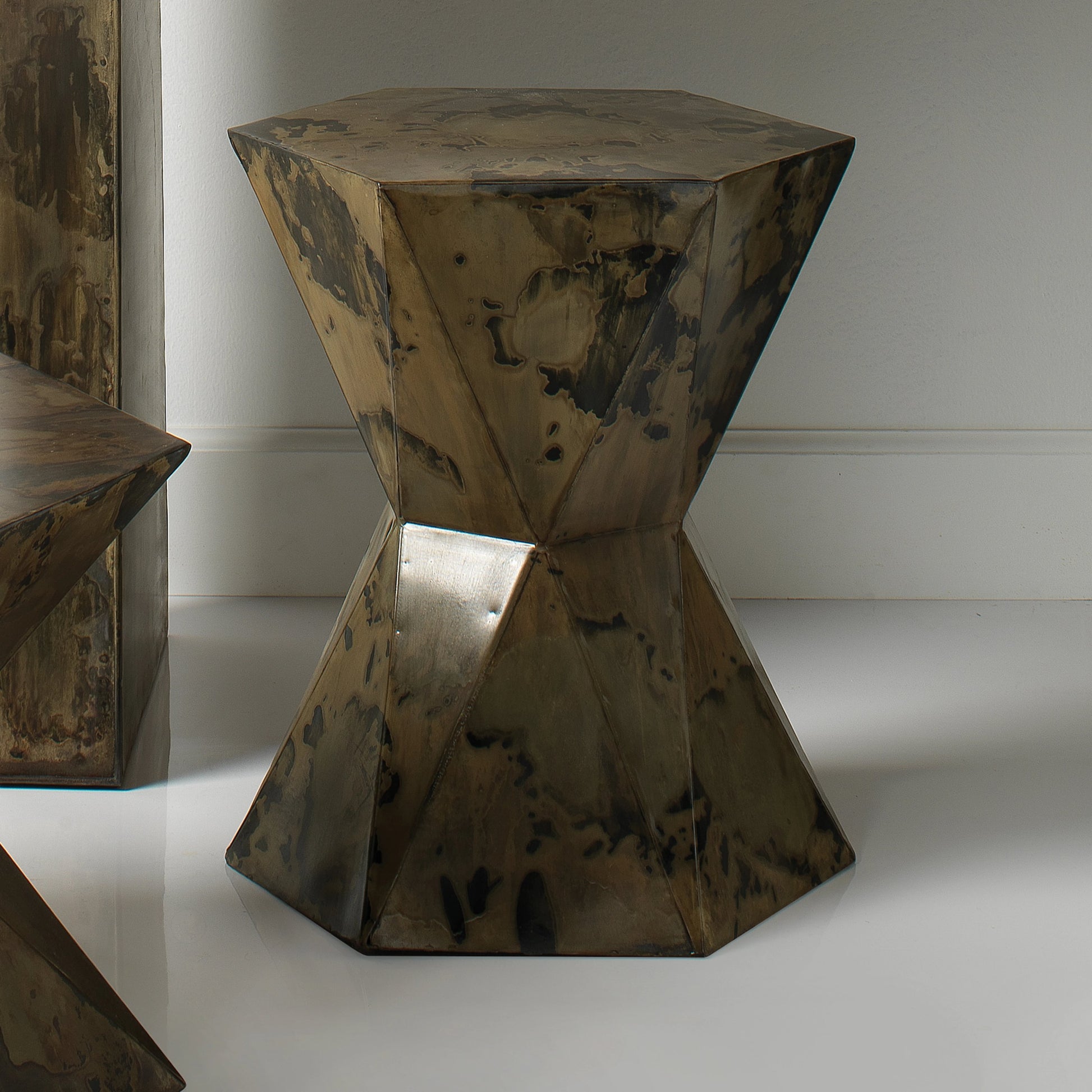 Crown Side Table by Jamie Young in black. Made from iron sheet in a eclectic & global style.